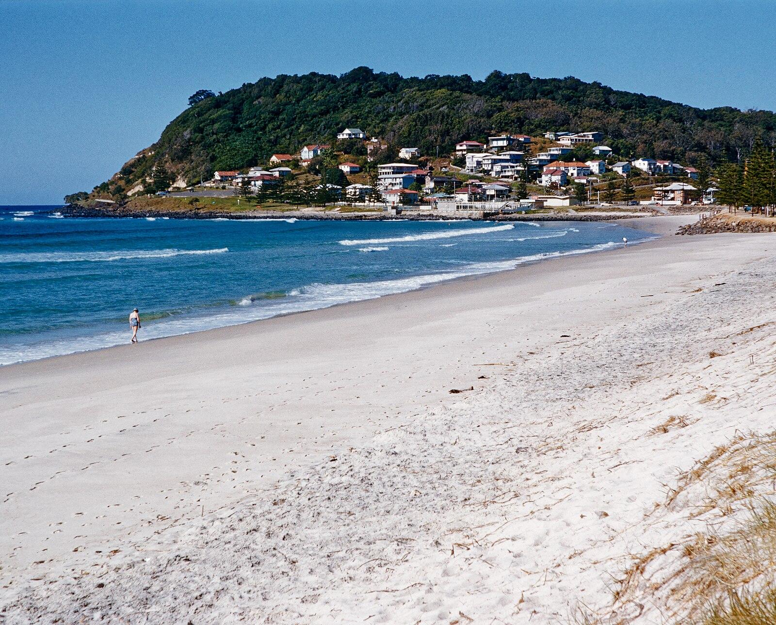 Looking South along Burleigh Heads beach, Queensland, Australia towards Burleigh Headland and the national park